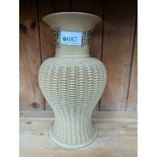 687 - Oriental vase with rattan effectHt 26 x diam 15 cms