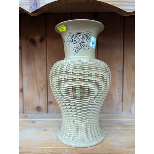 687 - Oriental vase with rattan effectHt 26 x diam 15 cms