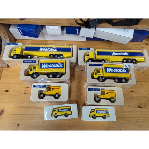 693 - Collection of boxed Weetabix vehicles by Corgi