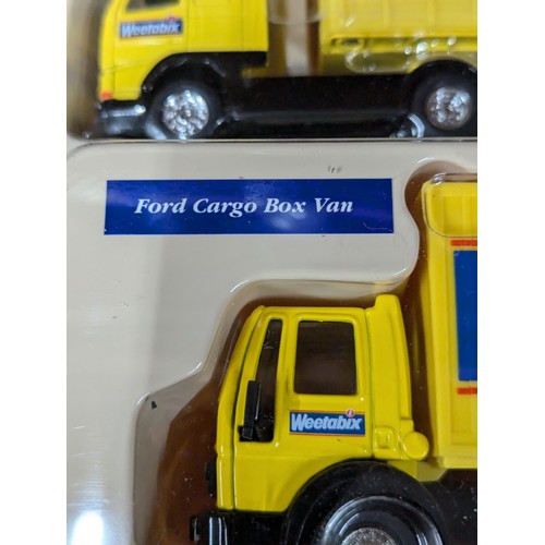 693 - Collection of boxed Weetabix vehicles by Corgi