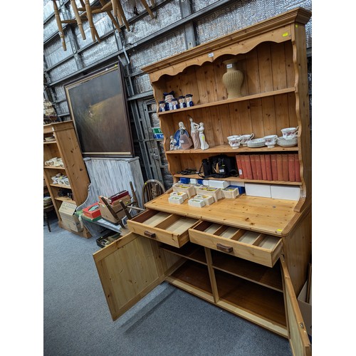 766 - Pine open faced dresser, with 2 drawers & 2 cupboards. W118cm d55cm h198cm