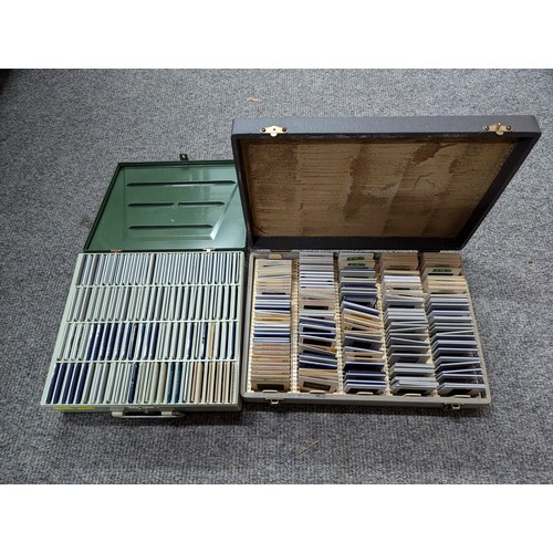 694 - Collection of photographic slides in two cases, inc. flora, fauna and landscapes, world places