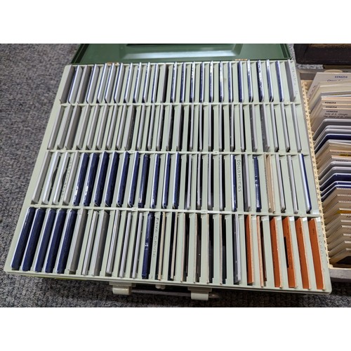 694 - Collection of photographic slides in two cases, inc. flora, fauna and landscapes, world places