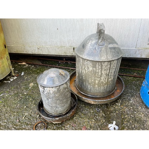 46A - 2 galvanized bird feeders/drinkers.