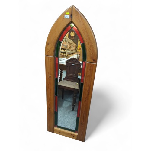 776 - Pine framed arch top stained style mirror. H142cm w48cm