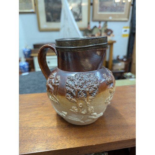 710 - Hunting scene jug together with four mini character jugs