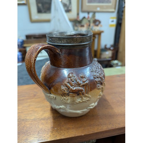 710 - Hunting scene jug together with four mini character jugs