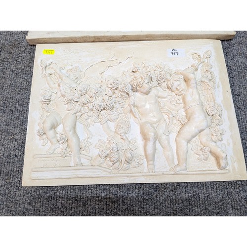 717 - Two plaster plaques of classical scenes, largest 46 x 37cm