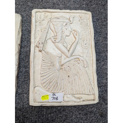 718 - Two Egyptian style plaster plaques, 20 x 29.5cm together with a bust of Tutankhamun