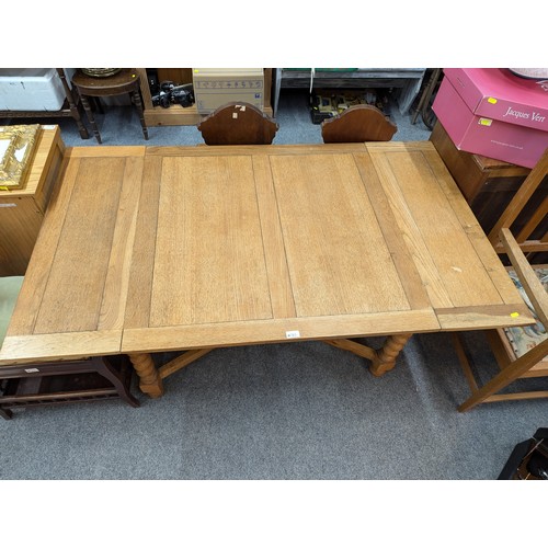 783 - Light oak extendable table with barley twist supports, extended L151 x W91 x H72cm