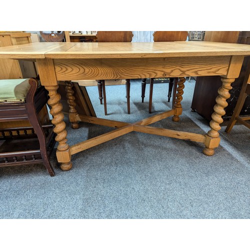 783 - Light oak extendable table with barley twist supports, extended L151 x W91 x H72cm