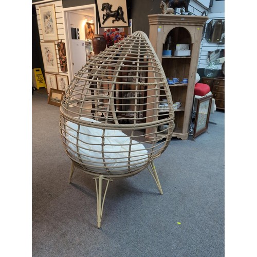 739 - Rattan effect basket chair. h148cm