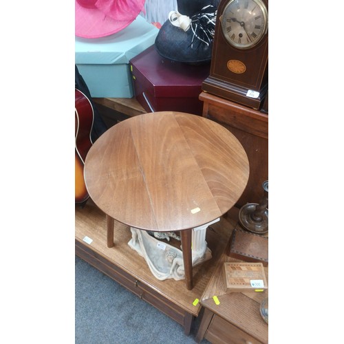 785A - Small round side table.