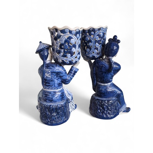 396 - Pair of Chinese blue and white figurative jardinieres, ht. 33cm