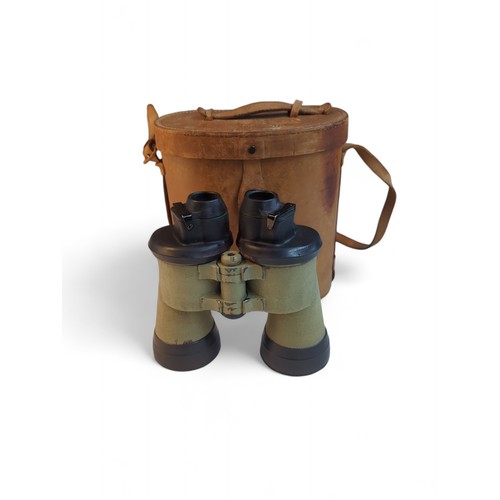 387 - Pair of WWII U boat binoculars marked 7 x 50 cxn 457265.With leather case. Case is marked: Case, car... 