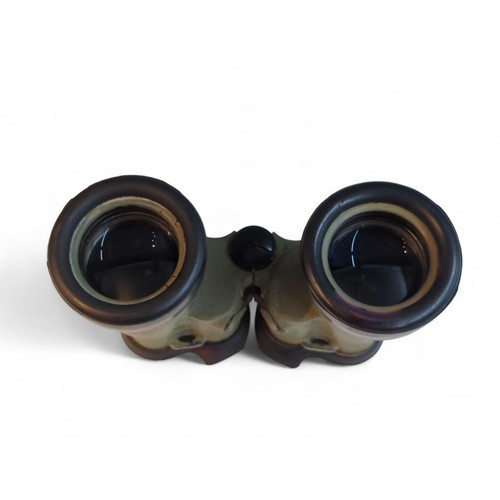 387 - Pair of WWII U boat binoculars marked 7 x 50 cxn 457265.With leather case. Case is marked: Case, car... 