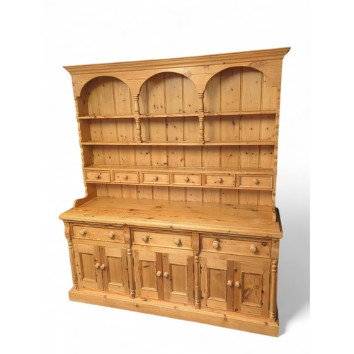 80 - Pine dresser. W173cm D53cm H198cm.