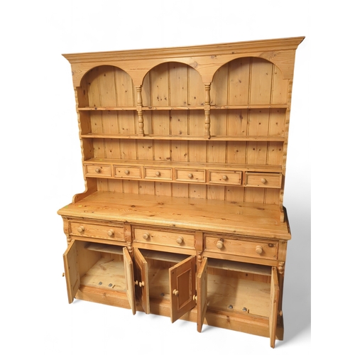 80 - Pine dresser. W173cm D53cm H198cm.