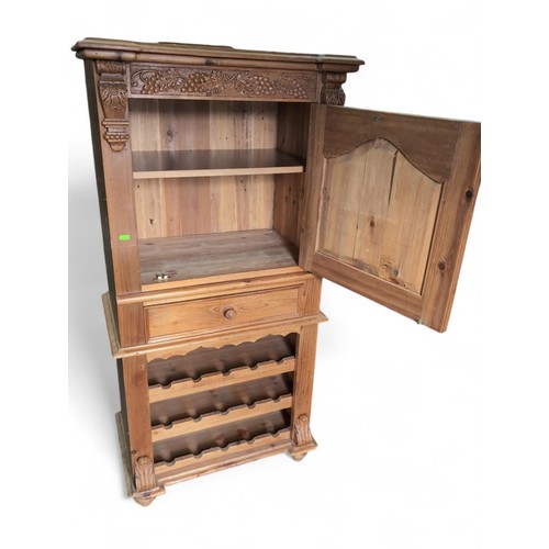 100 - Mediterranean pine wine rack cupboard. W70cm D46cm H142cm 