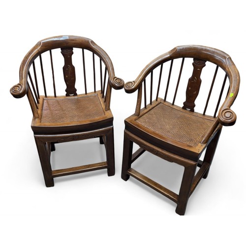 106 - Pair of Chinese horseshoe chairs with rattan seats. H90cm.