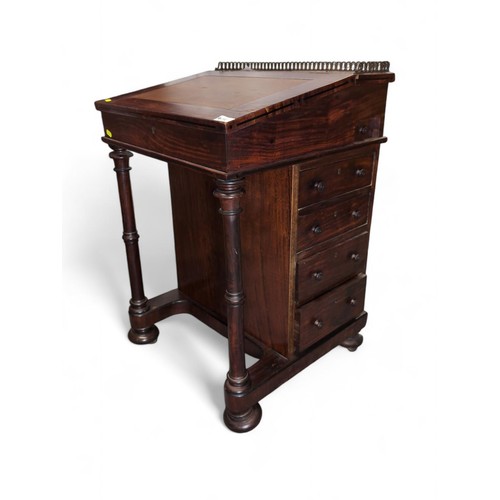 54 - Davenport writing desk with brass gallery and leather top. On casters. W53cm D52cm H83cm.