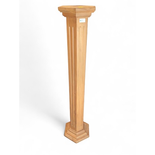 67 - Wooden column jardiniere/torchere stand in hexagonal shape. H120cm.