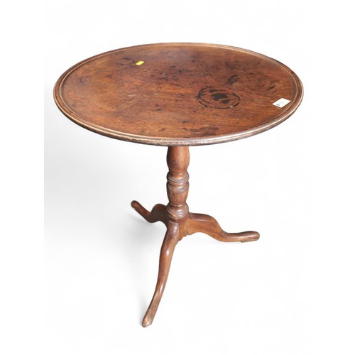 68 - Lockable tilt-top wine table. Diameter 57cm H67cm.