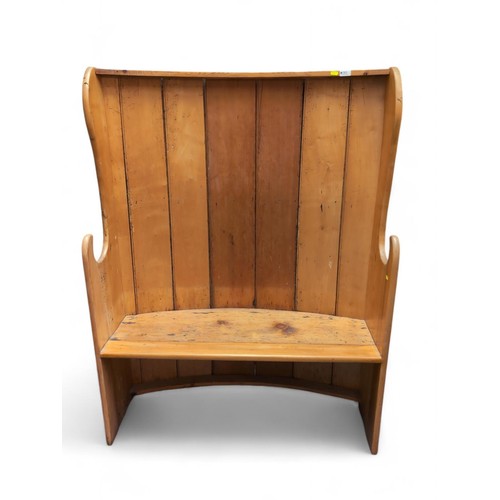 90 - Pine bow back settle. Includes cushion seat. W107cm d32cm H140cm