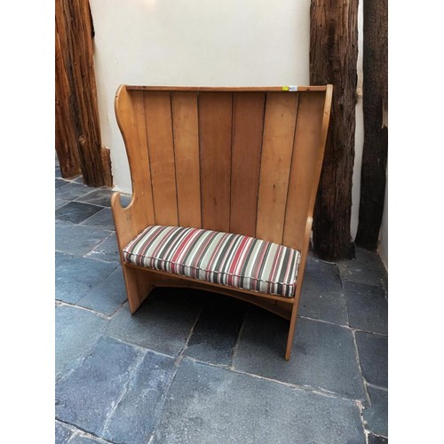 90 - Pine bow back settle. Includes cushion seat. W107cm d32cm H140cm