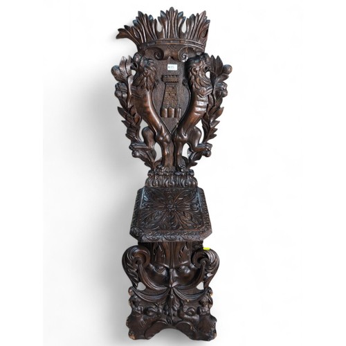 115 - Heavily-carved Italian Sgabello hall chair. H130cm.