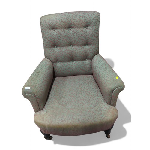 83 - Upholstered button back armchair on casters. W83cm D90cm H100cm.