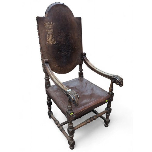 117 - C.19th throne-style armchair with ram's head armrests and backrest embossed with rampant lion and gi... 