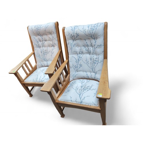 125 - Light oak Victorian-style armchairs with modern upholstery.