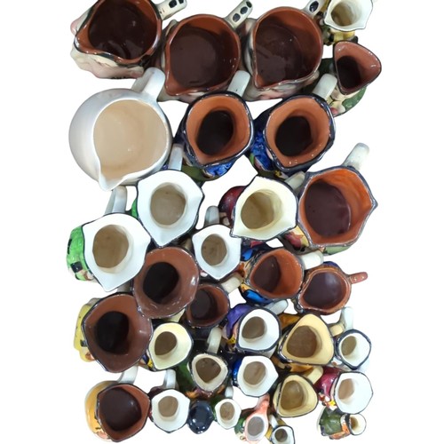 466 - Quantity of various sized toby jugs by various makers