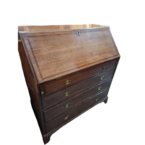 105A - Late C.19th - early C.20th oak bureau with fitted compartments inc. 2 cupboards and 6 drawers.