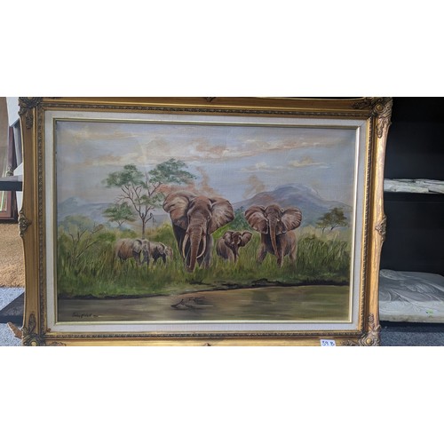 39B - Oil on canvas of an elephant family group, signed John Mc. Neill and dated 1992 lower left, in gilt ... 