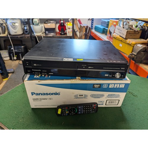 11 - Panasonic VHS/DVD player with built-in Freeview. With remote. Model no. DMR-EZ48V. In original box.