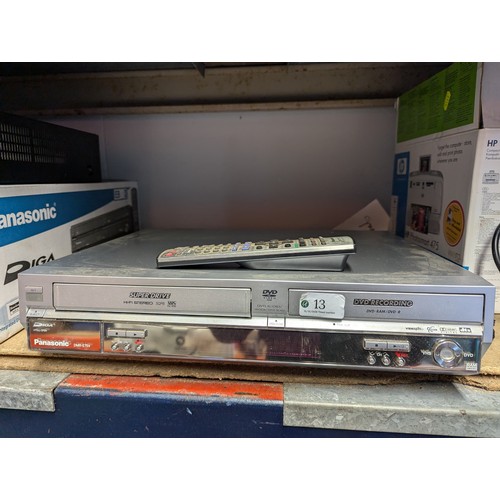 13 - Panasonic VHS/DVD player. With remote. Model no. DMR-E75V. 