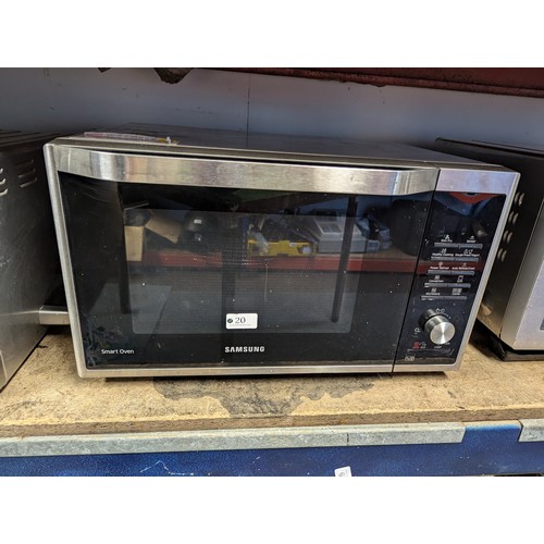 20 - Samsung Smart combi microwave. 900W. Model no. MC32J7055CT.