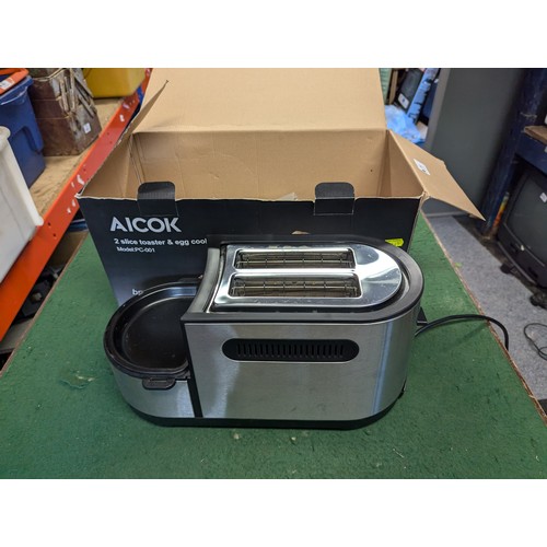 39 - Aicok 2 slice toaster and egg cooker. Model no. PC-001. In box.