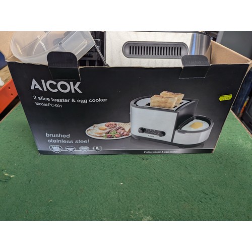 39 - Aicok 2 slice toaster and egg cooker. Model no. PC-001. In box.