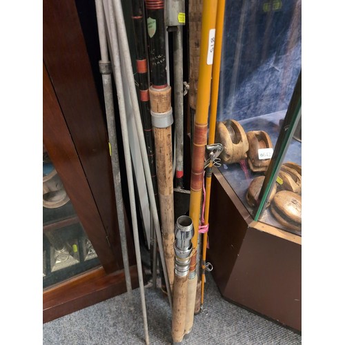 208 - Three rods inc. beach casting and boat with stands