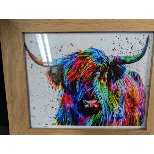 127A - 5 x various artworks inc. 2 x highland cows prints, boy and dog print and travel advert. Largest mea... 