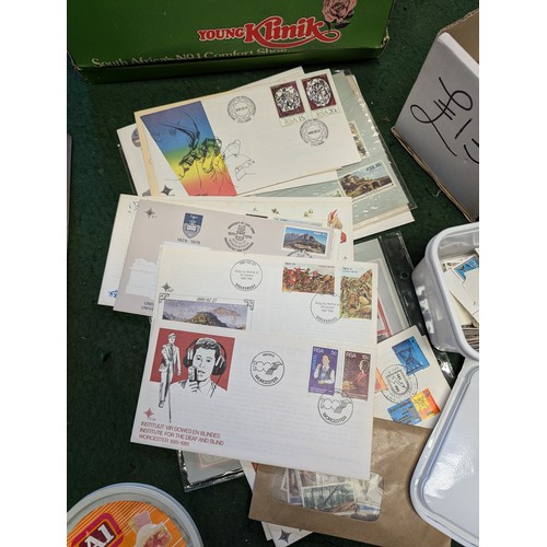 187 - Shoebox of loose stamps (mainly South African) + Stamps of the Republic of South Africa Handbook/Cat... 