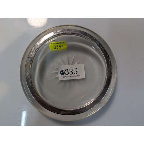 868 - Silver rimmed glass bottle coaster, Birmingham hallmarks, diameter 13cm