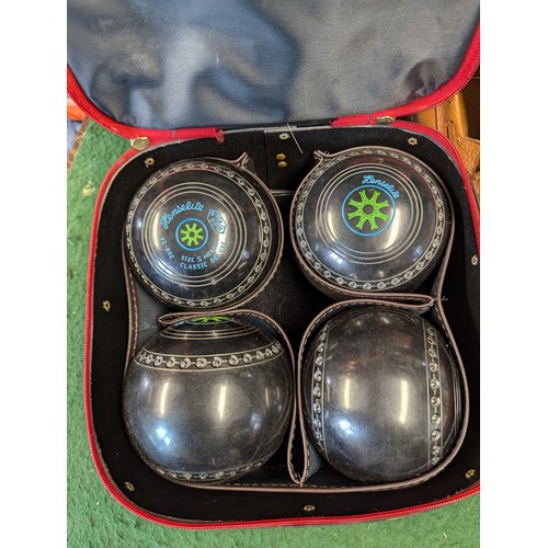 232 - Lindop set of 4 lawn bowls + shoes, chalk marker, jack, cloths etc.