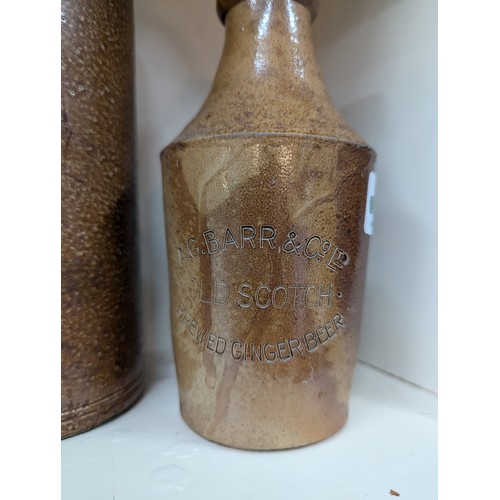 962 - Four stoneware bottles, inc. one marked A.G Barr Old Scotch Ginger Beer