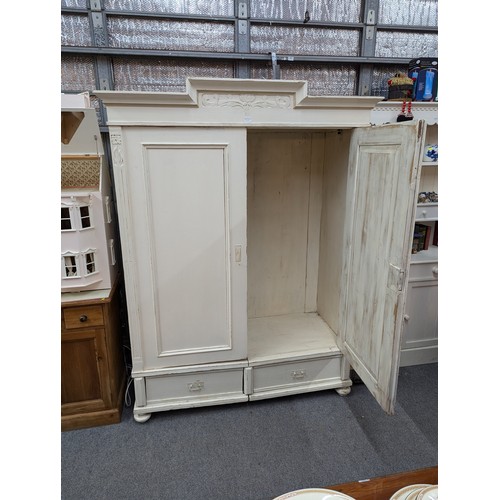 957A - Cream painted wardrobe with two lower drawers and Art Nouveau motifs W159 x D65 x H199cm