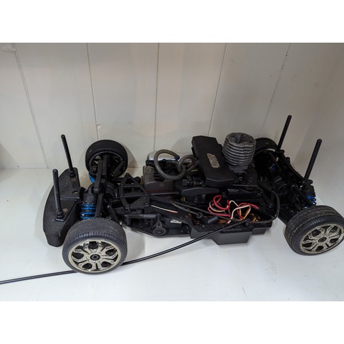 946 - Petrol 1/10 remote control on-road car with remote but radio gear appears to be missing