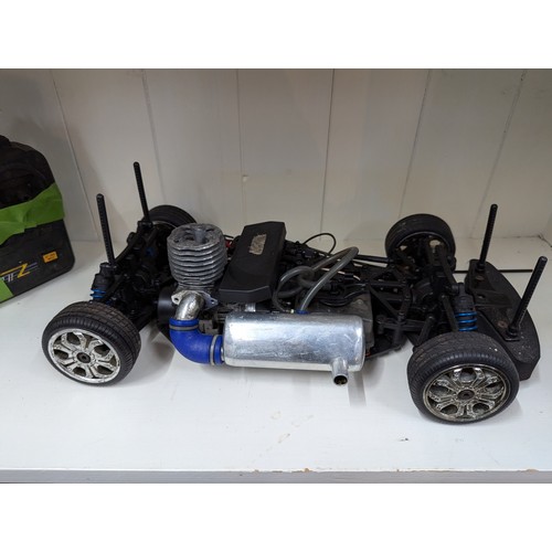 946 - Petrol 1/10 remote control on-road car with remote but radio gear appears to be missing